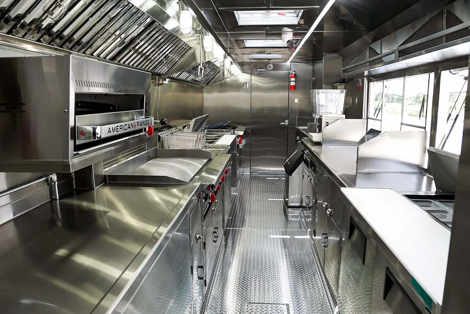 Food concession trailer layout with sink system, prep counter, and cooking equipment